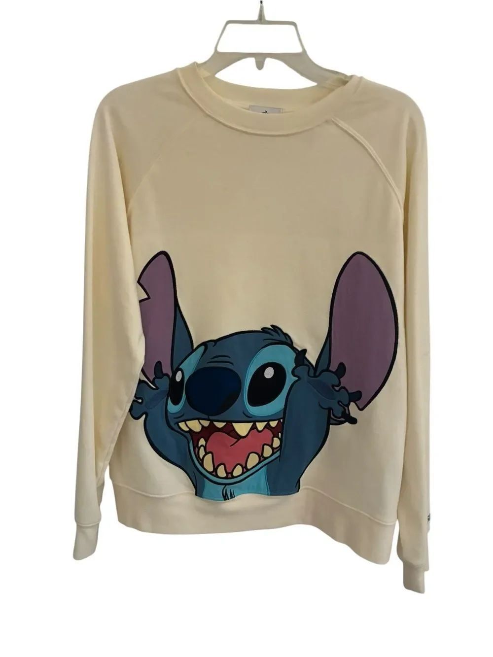 Disney Cream Crewneck Sweatshirt with Black Logo Tag